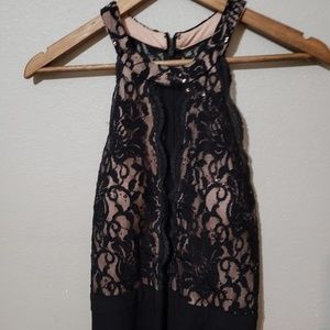 Long black dress with lace top.